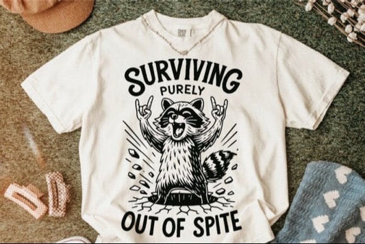 SURVIVING PURELY PUT OF SPITE GRAPIC TOP